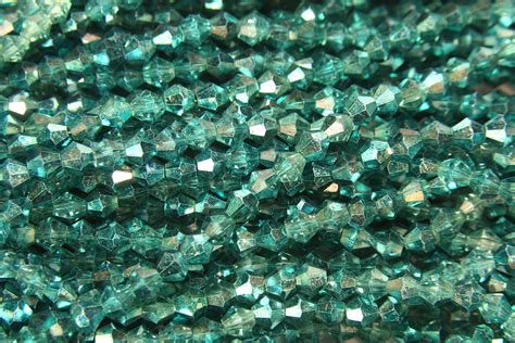 Demi Coated Metallic Teal Crystal Bicones Bead Spider