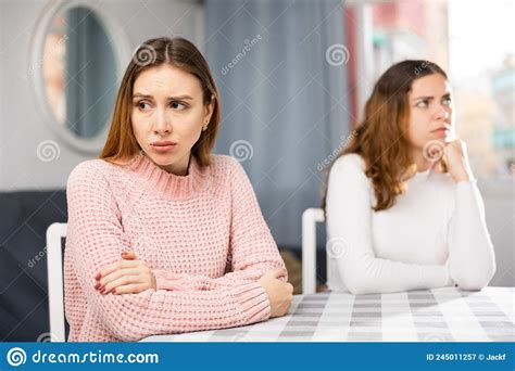 Annoyed Stressed Female Couple Sitting At Home Stock Image Image Of