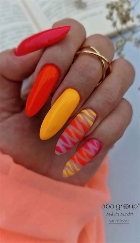 Dive Into Summer With Vibrant Nail Art Designs Bold And Warm Tones