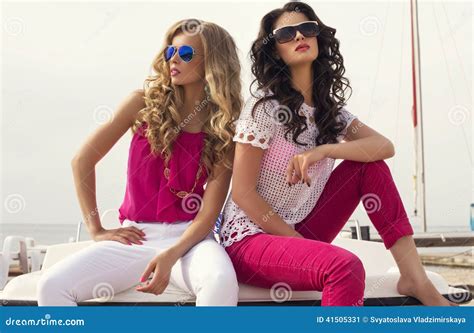 Beautiful Girls With Sunglasses Posing On Summer Beach Stock Image Image Of Bikini Posing