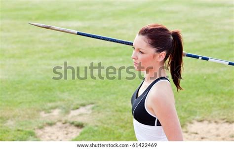 Concentrated Female Athlete Ready Throw Javelin Stock Photo 61422469