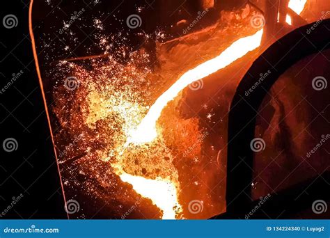 The Molten Iron Flows Into The Bucket Photo Was Taken In A Production