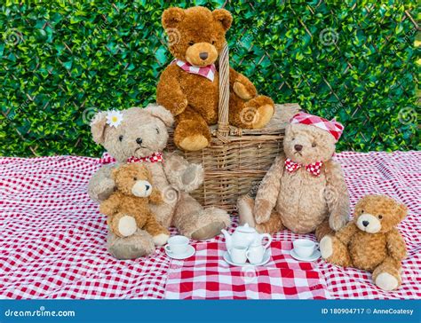Teddy Bear`s Picnic Five Teddy Bears Enjoying A Picnic In The Garden
