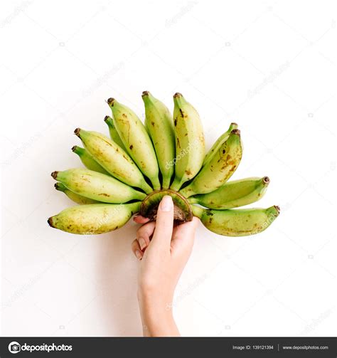 Hand Holding Bunch Of Bananas — Stock Photo © Maximleshkovich 139121394