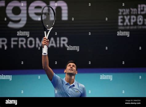 Serbia S Novak Djokovic Returns To Canada S Vasek Pospisil During The