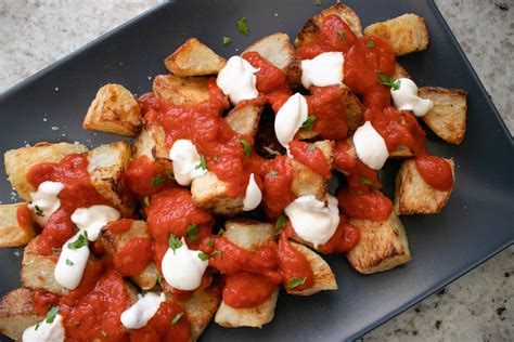 Baked Patatas Bravas Spanish Potatoes The Delicious Plate