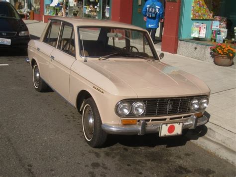 OLD PARKED CARS 1967 Datsun Bluebird Sedan