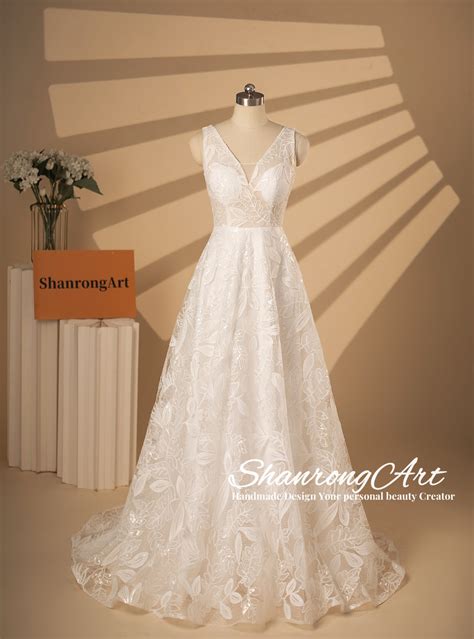 Ivory Fitted Leaf Lace Wedding Dress With Sheer V Neck A Line Wedding