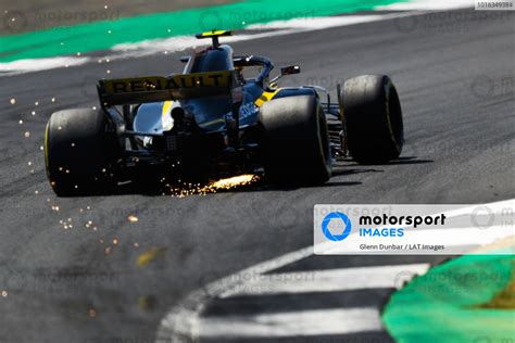 Sparks Fly From The Rear Of Carlos Sainz Jr Renault Sport F1 Team R S