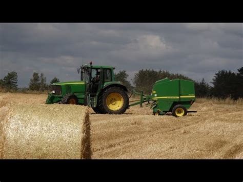 Baling The Straw Harvest With John Deere Tractor And Baler YouTube