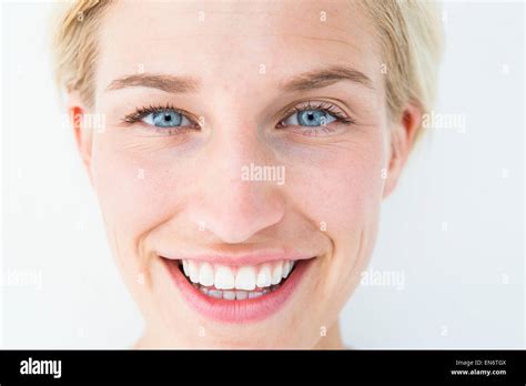 Happy Blonde Smiling At Camera Stock Photo Alamy