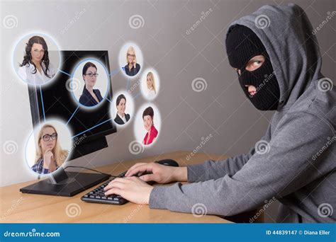 Masked Thief Stealing Data From Computers Stock Photo Image