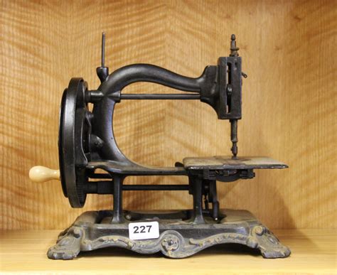 A 19th Century Cast Iron Sewing Machine H 29cm