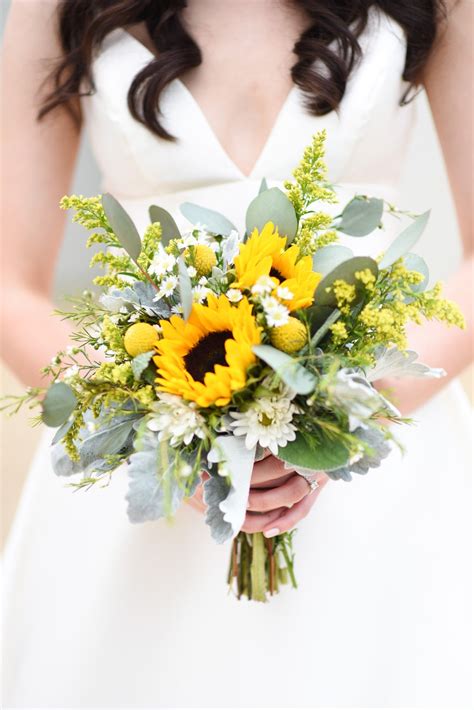 A Friend Of The Bride Created This Clutch Which Featured Two Sunflowers And Soft Elements Like