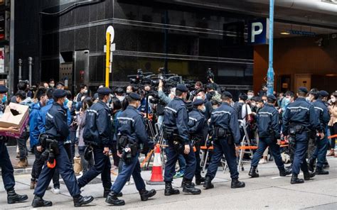 Hong Kong Police Raid News Outlets Office After Arresting Six For