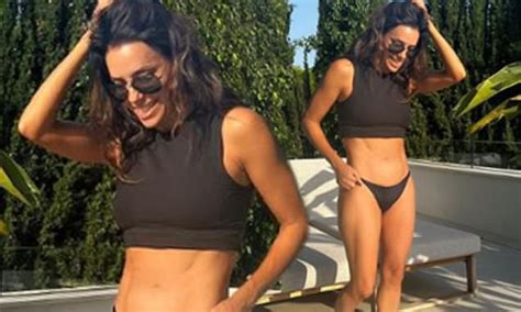 Eva Longoria Flashes Her Incredible Figure In A Black Crop Top And Bikini Bottoms Daily Mail