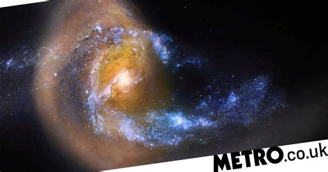 Galactic Battle Captured As Hubble Spots A Galaxy Being Torn Apart