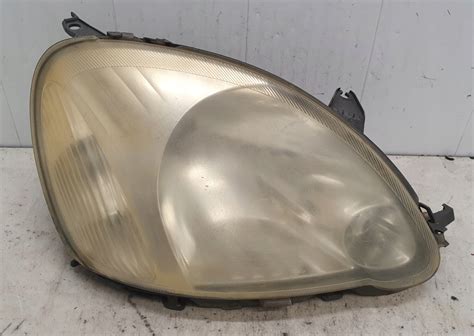 TOYOTA YARIS I LIFT LAMPA PRZÓD PRAWA ORYGINAŁ EUROPA 89007613 za 230