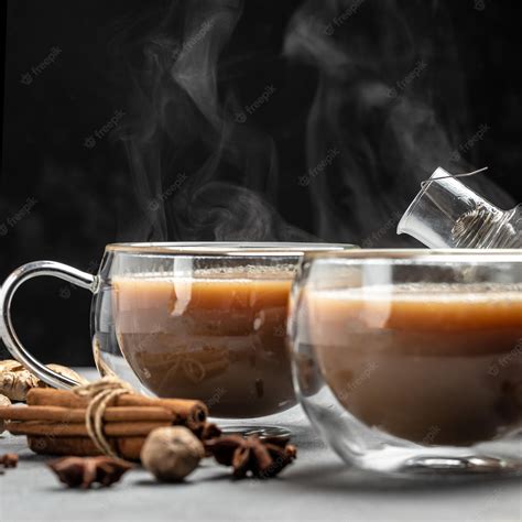 Premium Photo Two Mugs Of Masala Tea Hot Indian Masala Chai Tea With Milk And Spices In A