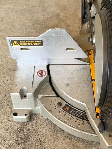 Lot 196R DeWalt Compound Miter Saw DW703 EstateSales Org