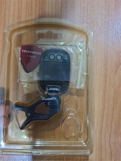 Guitar Pick And Tuner Hobbies And Toys Music And Media Musical