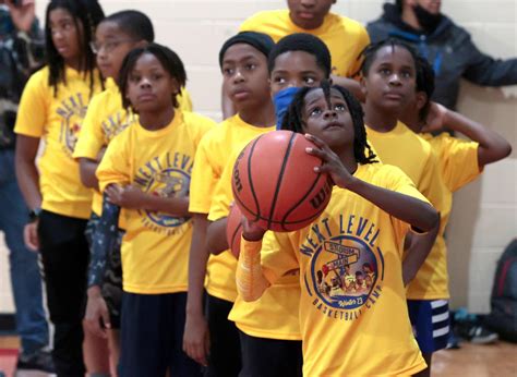 Michigan basketball players mentor Detroit youths at SAY Detroit's first basketball camp