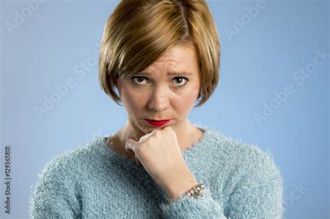 Woman Looking Suspicious And Sad In Guilty And Sorry Face Expression