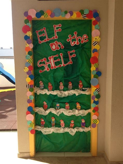 An Elf On The Shelf Bulletin Board Is Displayed In Front Of A Door With