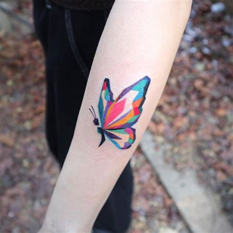 Colorful Butterfly Tattoo Located On The Forearm