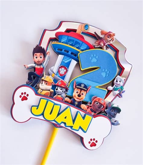 A Paw Patrol Birthday Cake Topper With The Number 2 On It And Paw