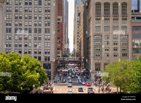 Elevated View Over Monroe Street With Elevated Train In Downtown Loop