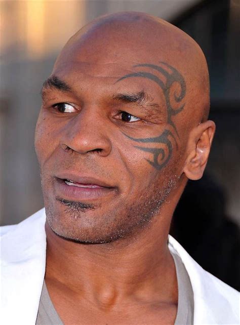 Hollywood Stars With Tattoos Mike Tyson Tattoo With Maori Symbol