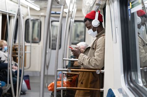 Premium Photo Afro Passenger Man In Subway Train Wear Face Mask To