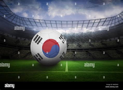 Football in south korea colours in large football stadium with lights ...