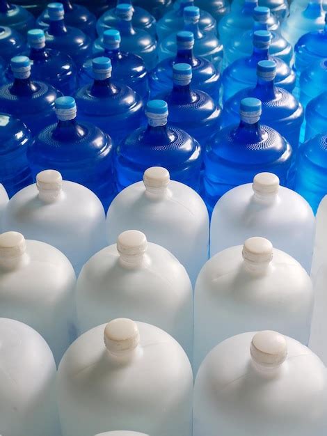 Premium Photo Top View Of Plastic Big Bottles Or White And Blue