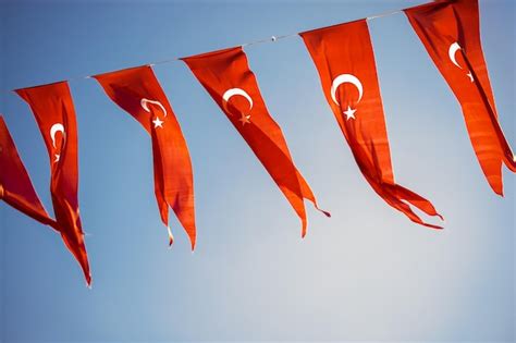 Premium Photo Turkish National Flags With White Star And Moon In Sky