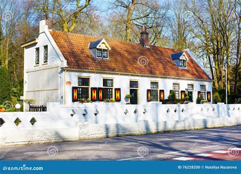 Colorful Dutch House With Red Tile Roof In Holland Editorial Image