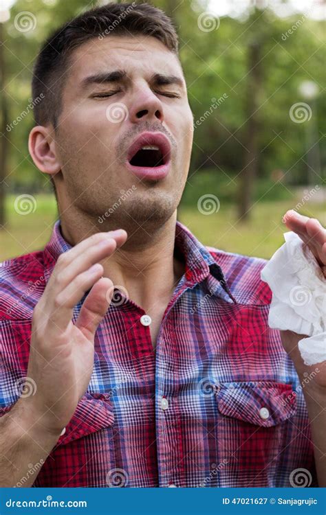 A Young Man With A Allergy Sneezing Stock Image - Image: 47021627