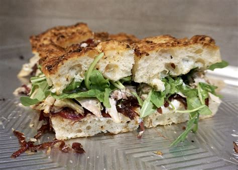 Roasted Chicken Focaccia Sandwich With Goat Cheese Red Onion Jam And