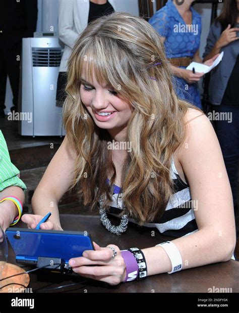 Debby Ryan Plays At The Nintendo Dragon Quest Ix Sentinels Of The