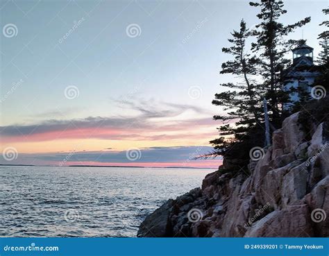 Puesta De Sol En El Faro Imagen De Archivo Imagen De Reflejo 249339201