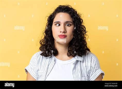 Portrait Of Funny Woman With Dark Wavy Hair Making Silly Comical Face