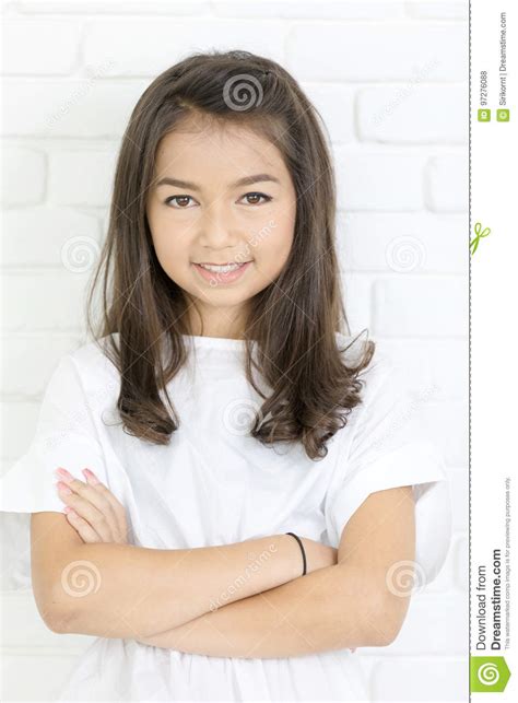 Headshot Portrait Of Happy Cute Girl Smiling Looking At Camera Stock