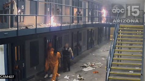 New videos show inmates lighting fires outside Arizona prison cells