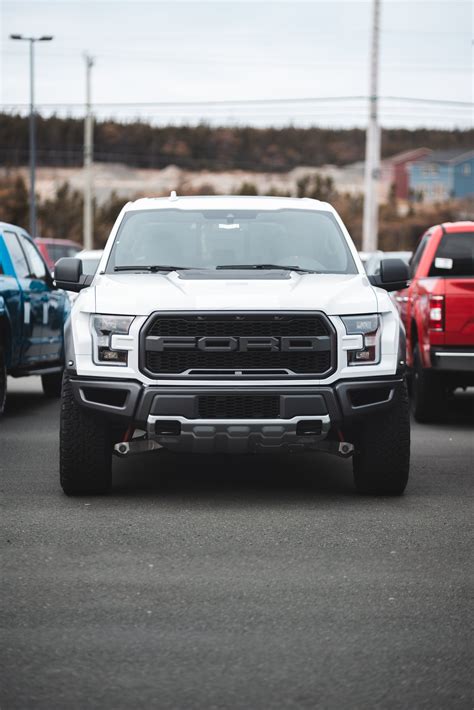 White Ford Car on Road · Free Stock Photo