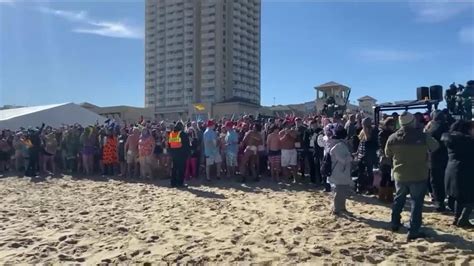 Thousands Take Polar Plunge At Oceanfront To Benefit Special Olympics