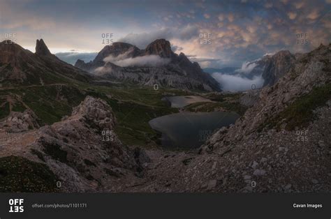 , the lakes di piani and on the right entering a mammatus clouds stock ...