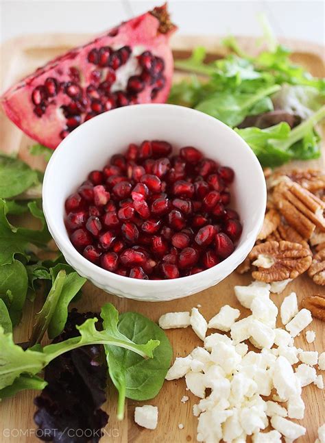 Mixed Green Salad With Pomegranate Seeds Feta And Pecans The Comfort Of Cooking