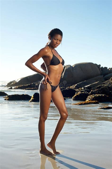 Beautiful African American Woman In Black Bikini At The Beach Stock