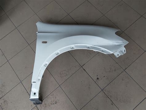 QASHQAI J10 LIFT BŁOTNIK PRAWY PRZÓD TRIM 326G za 100 zł z Pleszew